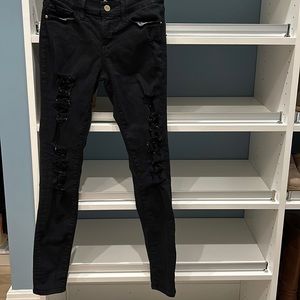 Black distressed jeans from Frame. Size 25.